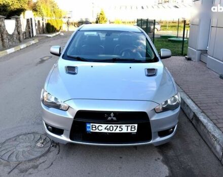Серый Мицубиси Лансер, объемом двигателя 2 л и пробегом 223 тыс. км за 6500 $, фото 1 на Automoto.ua