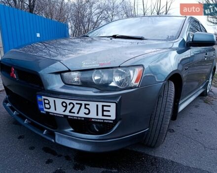 Серый Мицубиси Лансер, объемом двигателя 2 л и пробегом 206 тыс. км за 7300 $, фото 1 на Automoto.ua