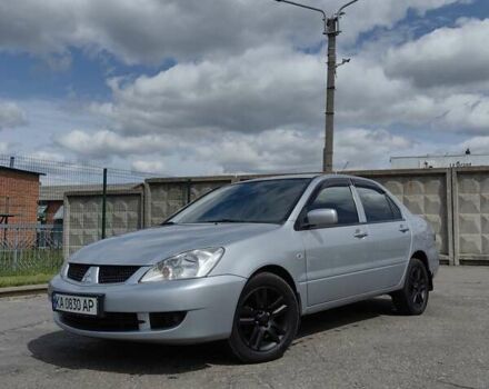 Сірий Міцубісі Lancer, об'ємом двигуна 1.6 л та пробігом 300 тис. км за 5700 $, фото 1 на Automoto.ua