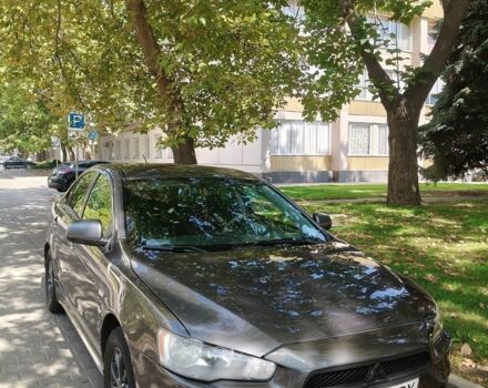 Серый Мицубиси Лансер, объемом двигателя 2 л и пробегом 230 тыс. км за 7650 $, фото 1 на Automoto.ua