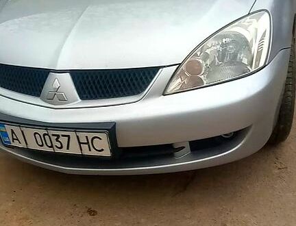 Серый Мицубиси Лансер, объемом двигателя 1.6 л и пробегом 0 тыс. км за 4500 $, фото 1 на Automoto.ua
