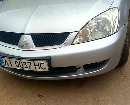 Серый Мицубиси Лансер, объемом двигателя 1.6 л и пробегом 0 тыс. км за 4500 $, фото 1 на Automoto.ua