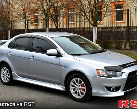 Серый Мицубиси Лансер, объемом двигателя 2 л и пробегом 178 тыс. км за 7400 $, фото 1 на Automoto.ua