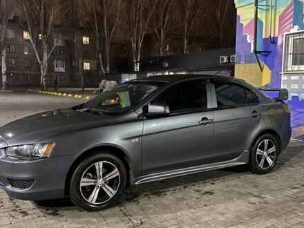 Серый Мицубиси Лансер, объемом двигателя 1.5 л и пробегом 227 тыс. км за 7300 $, фото 1 на Automoto.ua