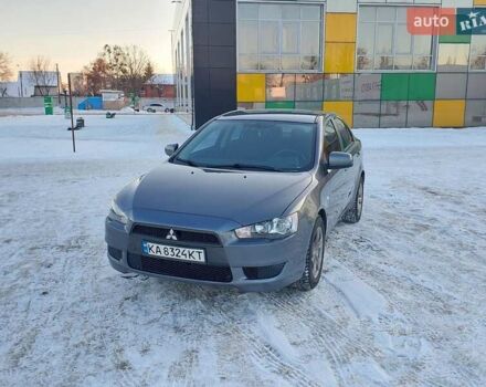 Серый Мицубиси Лансер, объемом двигателя 1.5 л и пробегом 174 тыс. км за 5400 $, фото 1 на Automoto.ua