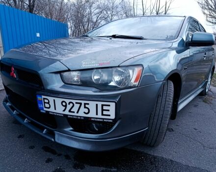 Серый Мицубиси Лансер, объемом двигателя 2 л и пробегом 203 тыс. км за 7300 $, фото 1 на Automoto.ua