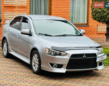 Сірий Міцубісі Lancer, об'ємом двигуна 2 л та пробігом 173 тис. км за 7200 $, фото 1 на Automoto.ua