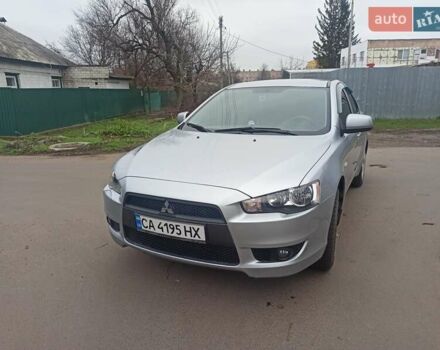 Серый Мицубиси Лансер, объемом двигателя 1.5 л и пробегом 255 тыс. км за 7500 $, фото 1 на Automoto.ua