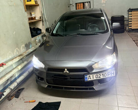 Сірий Міцубісі Lancer, об'ємом двигуна 2 л та пробігом 238 тис. км за 8600 $, фото 1 на Automoto.ua