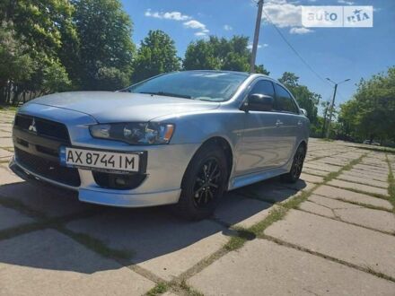 Сірий Міцубісі Lancer, об'ємом двигуна 2 л та пробігом 130 тис. км за 8100 $, фото 1 на Automoto.ua