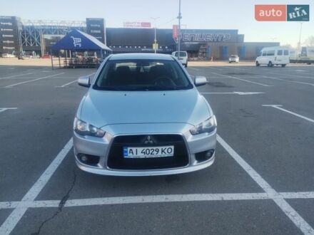 Сірий Міцубісі Lancer, об'ємом двигуна 1.6 л та пробігом 200 тис. км за 7100 $, фото 1 на Automoto.ua