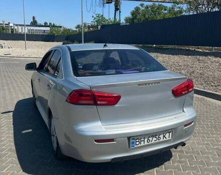 Сірий Міцубісі Lancer, об'ємом двигуна 2 л та пробігом 166 тис. км за 7499 $, фото 1 на Automoto.ua