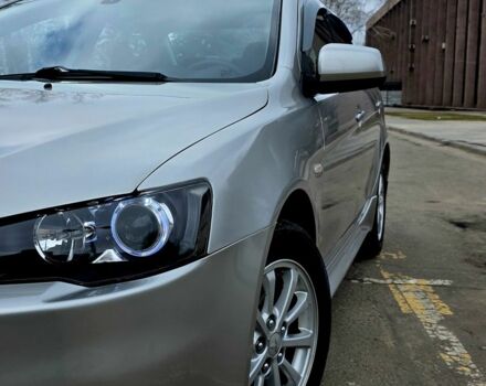 Серый Мицубиси Лансер, объемом двигателя 1.6 л и пробегом 79 тыс. км за 8500 $, фото 1 на Automoto.ua