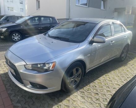 Серый Мицубиси Лансер, объемом двигателя 1.6 л и пробегом 190 тыс. км за 8000 $, фото 1 на Automoto.ua