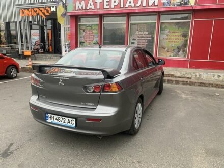 Сірий Міцубісі Lancer, об'ємом двигуна 2 л та пробігом 170 тис. км за 7198 $, фото 1 на Automoto.ua