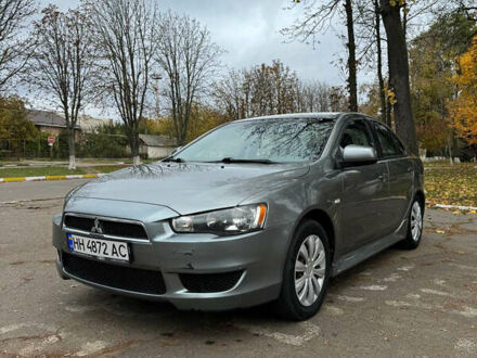 Сірий Міцубісі Lancer, об'ємом двигуна 2 л та пробігом 170 тис. км за 7400 $, фото 1 на Automoto.ua