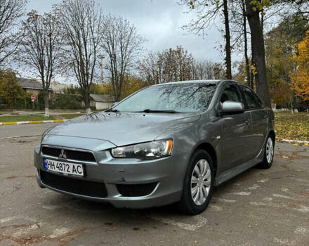 Сірий Міцубісі Lancer, об'ємом двигуна 2 л та пробігом 170 тис. км за 7400 $, фото 1 на Automoto.ua