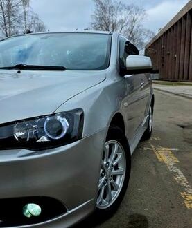 Серый Мицубиси Лансер, объемом двигателя 1.6 л и пробегом 79 тыс. км за 8500 $, фото 1 на Automoto.ua