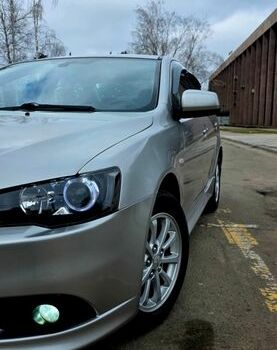 Серый Мицубиси Лансер, объемом двигателя 1.6 л и пробегом 79 тыс. км за 8500 $, фото 1 на Automoto.ua