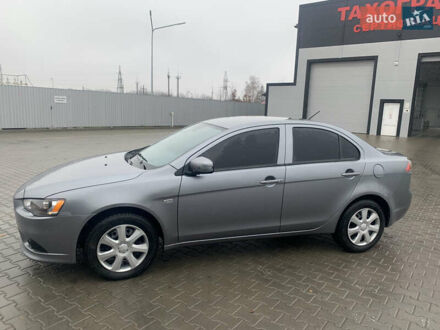 Серый Мицубиси Лансер, объемом двигателя 1.59 л и пробегом 83 тыс. км за 9900 $, фото 1 на Automoto.ua