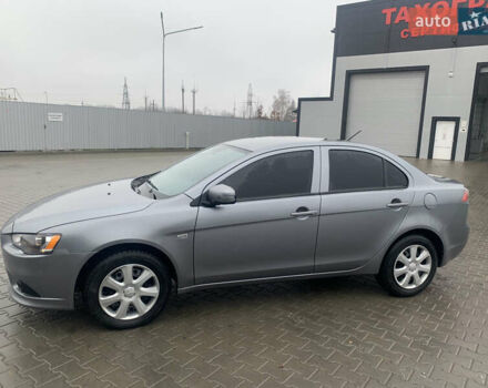 Сірий Міцубісі Lancer, об'ємом двигуна 1.59 л та пробігом 83 тис. км за 9900 $, фото 1 на Automoto.ua