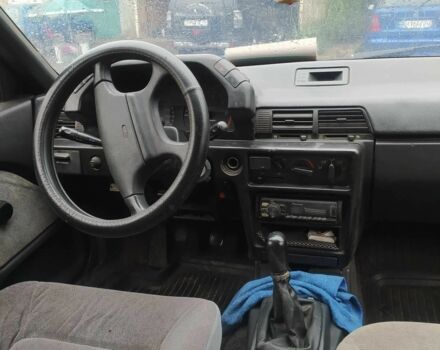 Синий Мицубиси Лансер, объемом двигателя 1.8 л и пробегом 263 тыс. км за 1600 $, фото 4 на Automoto.ua