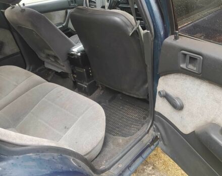 Синий Мицубиси Лансер, объемом двигателя 1.8 л и пробегом 263 тыс. км за 1600 $, фото 6 на Automoto.ua