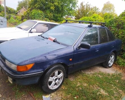 Синий Мицубиси Лансер, объемом двигателя 1.8 л и пробегом 263 тыс. км за 1600 $, фото 1 на Automoto.ua