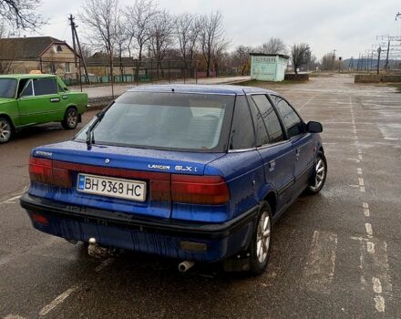 Синій Міцубісі Lancer, об'ємом двигуна 1.5 л та пробігом 255 тис. км за 2100 $, фото 5 на Automoto.ua