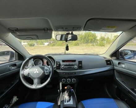 Синій Міцубісі Lancer, об'ємом двигуна 1.8 л та пробігом 195 тис. км за 6700 $, фото 7 на Automoto.ua