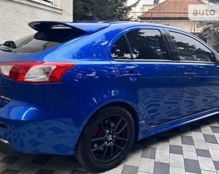 Синій Міцубісі Lancer, об'ємом двигуна 2 л та пробігом 133 тис. км за 12999 $, фото 19 на Automoto.ua