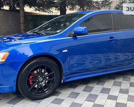 Синій Міцубісі Lancer, об'ємом двигуна 2 л та пробігом 133 тис. км за 12999 $, фото 12 на Automoto.ua