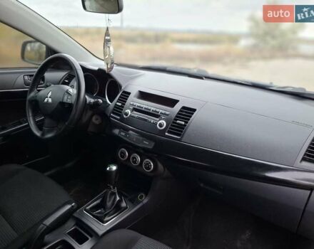 Мицубиси Лансер 2008 в Новомосковске на Automoto.ua Синий Мицубиси Лансер, объемом двигателя 1.8 л и пробегом 223 тыс. км за 4950 $, фото 7 на Automoto.ua
