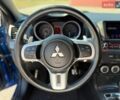 Синий Мицубиси Лансер, объемом двигателя 2 л и пробегом 140 тыс. км за 12900 $, фото 11 на Automoto.ua