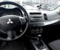 Синій Міцубісі Lancer, об'ємом двигуна 1.8 л та пробігом 198 тис. км за 6300 $, фото 12 на Automoto.ua