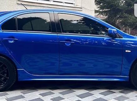 Синій Міцубісі Lancer, об'ємом двигуна 2 л та пробігом 133 тис. км за 12999 $, фото 17 на Automoto.ua