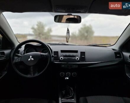 Мицубиси Лансер 2008 в Новомосковске на Automoto.ua Синий Мицубиси Лансер, объемом двигателя 1.8 л и пробегом 223 тыс. км за 4950 $, фото 9 на Automoto.ua