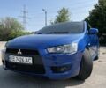 Синій Міцубісі Lancer, об'ємом двигуна 1.8 л та пробігом 195 тис. км за 6700 $, фото 1 на Automoto.ua