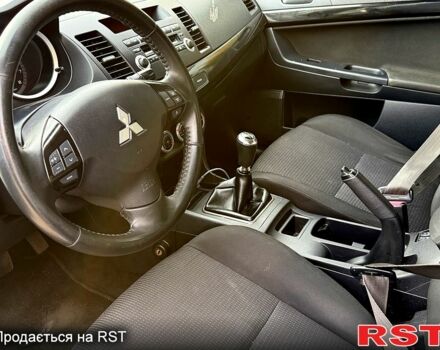 Синій Міцубісі Lancer, об'ємом двигуна 1.8 л та пробігом 222 тис. км за 4750 $, фото 4 на Automoto.ua