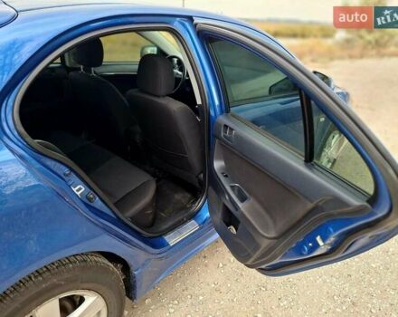 Мицубиси Лансер 2008 в Новомосковске на Automoto.ua Синий Мицубиси Лансер, объемом двигателя 1.8 л и пробегом 223 тыс. км за 4950 $, фото 13 на Automoto.ua