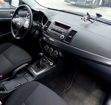 Синій Міцубісі Lancer, об'ємом двигуна 1.8 л та пробігом 198 тис. км за 6300 $, фото 10 на Automoto.ua