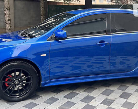 Синій Міцубісі Lancer, об'ємом двигуна 2 л та пробігом 133 тис. км за 12999 $, фото 14 на Automoto.ua