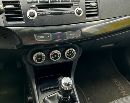 Синій Міцубісі Lancer, об'ємом двигуна 1.8 л та пробігом 221 тис. км за 6900 $, фото 5 на Automoto.ua