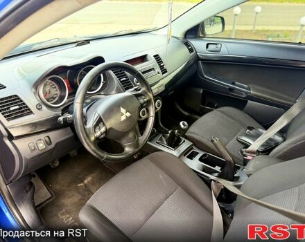 Синій Міцубісі Lancer, об'ємом двигуна 1.8 л та пробігом 222 тис. км за 4750 $, фото 6 на Automoto.ua