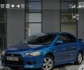 Синий Мицубиси Лансер, объемом двигателя 2 л и пробегом 220 тыс. км за 6400 $, фото 4 на Automoto.ua