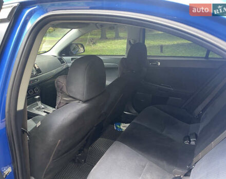 Синий Мицубиси Лансер, объемом двигателя 2.36 л и пробегом 320 тыс. км за 7700 $, фото 10 на Automoto.ua