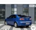 Синий Мицубиси Лансер, объемом двигателя 2 л и пробегом 220 тыс. км за 6400 $, фото 1 на Automoto.ua