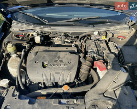 Синій Міцубісі Lancer, об'ємом двигуна 1.8 л та пробігом 223 тис. км за 9000 $, фото 9 на Automoto.ua