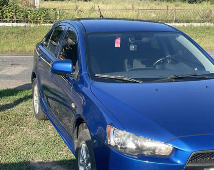 Синій Міцубісі Lancer, об'ємом двигуна 1.8 л та пробігом 223 тис. км за 9000 $, фото 4 на Automoto.ua
