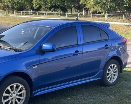 Синий Мицубиси Лансер, объемом двигателя 1.8 л и пробегом 228 тыс. км за 8300 $, фото 3 на Automoto.ua